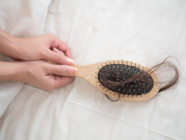 Выпадение волос прядями: причины и помощь Фото 1