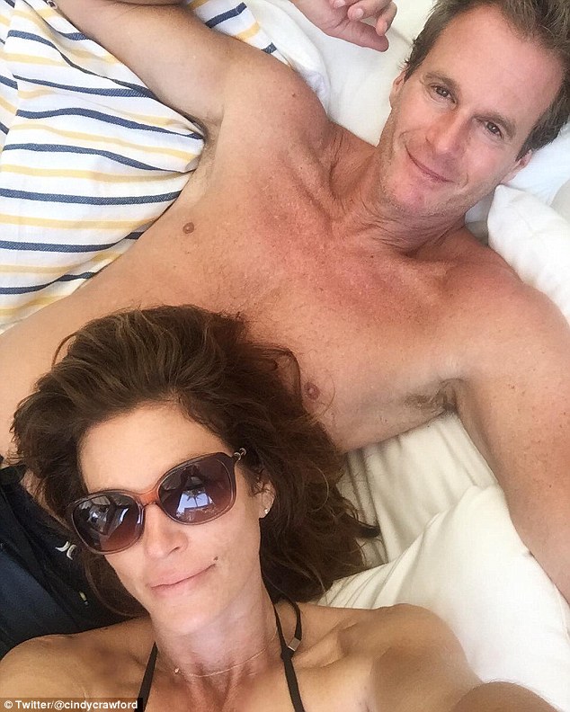 Second honeymoon? Cindy, 50, and her husband Rande Gerber, 53, travelled with their children, Kaia and Presley, but still found some time to spend by themselves